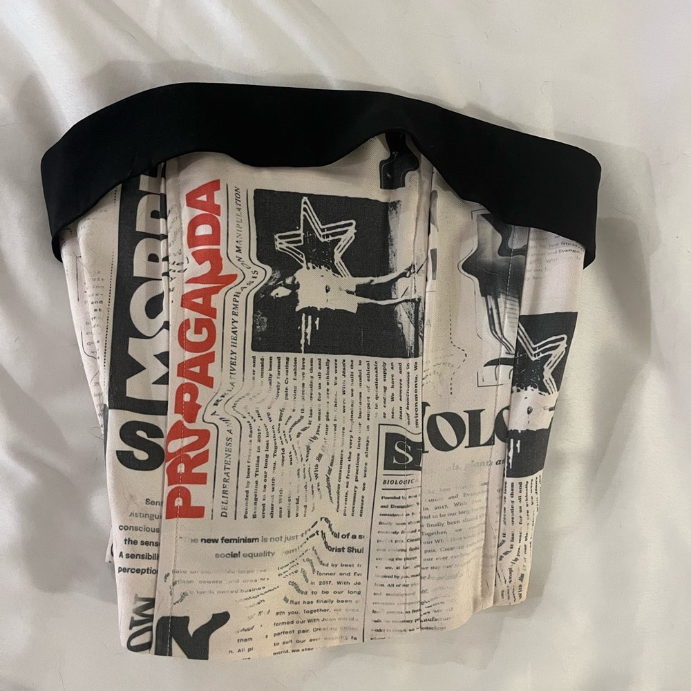 With Jean newspaper bustier